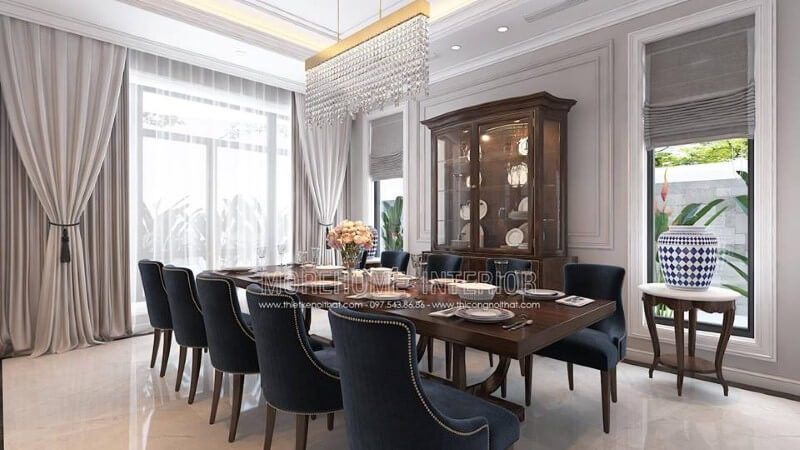 Bố trí nội thất phòng ăn gỗ óc chó tân cổ điển đẹp, sang trọng từ bàn gỗ nguyên khối, ghế bọc nệm cao cấp, kệ, tủ kệ trang trí.